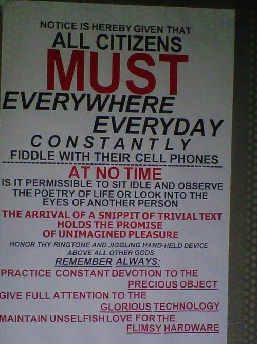 "official" notice requiring all citizens to "constantly fiddle with their cell phones", "give full attention to the glorious technology" and "maintain unselfish love for the flimsy hardware"